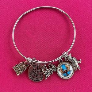 Harry Potter bracelet with five charms, two sided silver tone